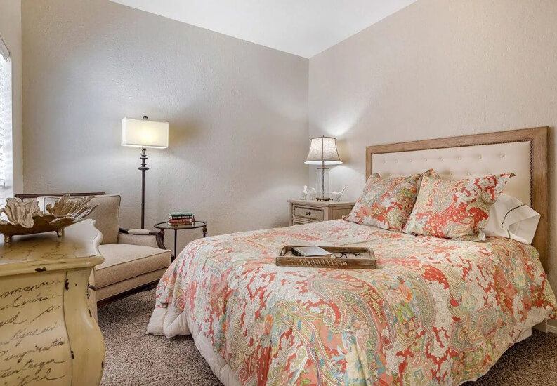 A Bright And Comfortable Bedroom at an Independent Living Facility A Bright And Comfortable Bedroom at an Independent Living Facility